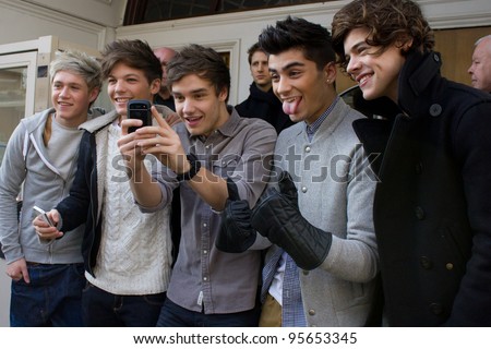 LONDON, UK - FEB. 20: Boyband One Direction lark around at the BBC Maida Vale Studios in London on the Feb 20, 2012 in London, UK