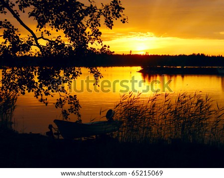 Lake at Sunset with Boat