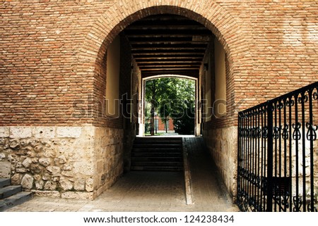 Brick arch of old house in Spain