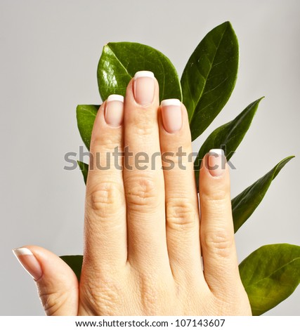 Beautiful hands with French manicure nails