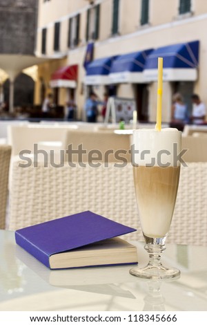 Latte restaurant. Purple book