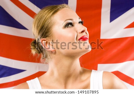 young woman on the background with british national flag. english language
