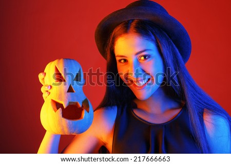 cute and funny witch with pumpkin. holiday Halloween