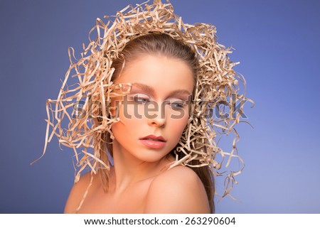young European woman with clear healthy perfect skin on  beige tones
