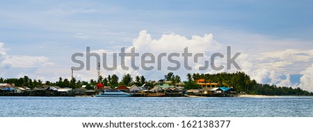 landscape with sea, sky and village, Asia, Thailand
