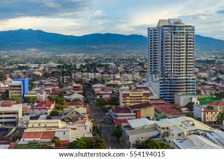 San Jose Costa rica capital city street view with mountains in the back