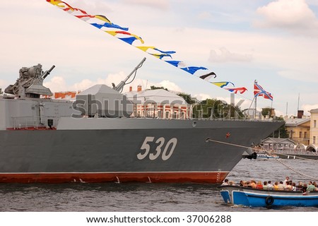 PETERSBURG - JULY 26: A destroyer moves along the river Neva during a Russian naval fleet parade on July 26, 2009 in Saint-Petersburg, Russia.