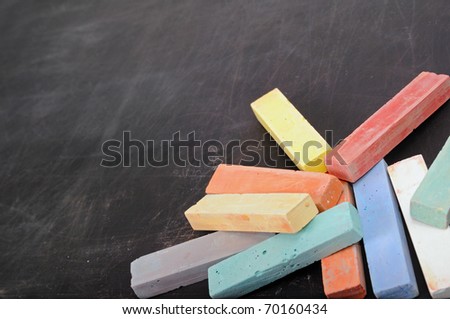 Colour school chalk on a black board
