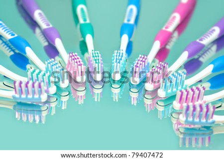 Toothbrushes in water drops