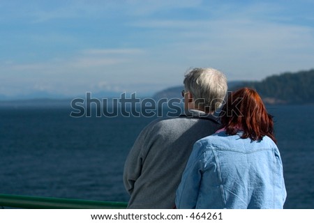 A couple watching from cruise ship
