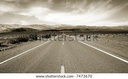 Empty californian highway through the desert