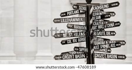 Famous signpost with directions to world landmarks in Pioneer Courthouse Square, Portland, Oregon