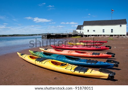 Colorful kayaks on the Prince Edward Island beach