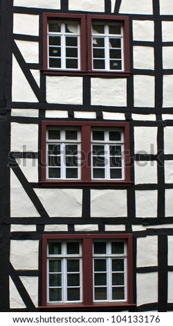 Detail of typical half timbered house in Monschau, Germany. The historic town center has many preserved half-timbered houses and narrow streets have remained nearly unchanged for 300 years