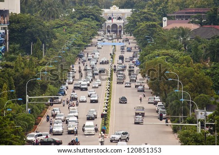 stock-photo-vientianne-laos-august-traffic-on-lane-xang-avenue-on-august-in-vientianne-laos-120851353.jpg