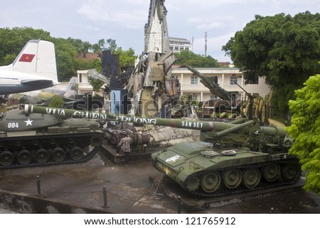 HANOI, VIETNAM - AUG 8: The famous Military History museum in Hanoi, Vietnam on Aug 8, 2012 with its collection of captured American aircraft and a war debris pyramid exhibit.