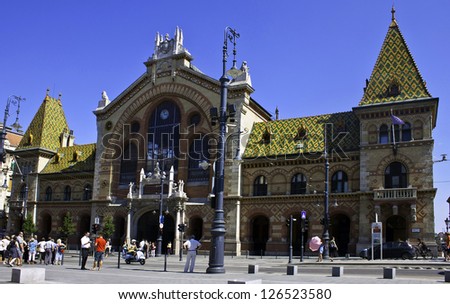 BUDAPEST - AUGUST 10: Tourists and local customers in front of the Great Market Hall on August 10, 2012 in Budapest, Hungary. The city\'s largest covered market hall opened in 1897.