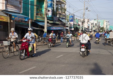 CHAU DOC, VIETNAM - JULY 23: Road Traffic on July 23, 2012 in Chau Doc, Vietnam. It is a town in the Mekong Delta region of Vietnam with a population of 112,155.