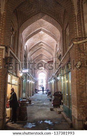 TABRIZ, IRAN - MARCH 10: People in a bazaar on March 10, 2013 in Tabriz, Iran. Bazaar of Tabriz was inscribed as World Heritage Site by UNESCO in July 2010.