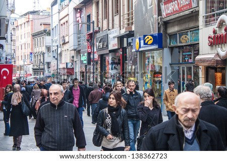 TRABZON, TURKEY - FEBRUARY 19: Unidentified people walk on a pedestrian zone in Trabzon, Turkey on February 19, 2013. Trabzon is a city in north-eastern Turkey with population 230,000.