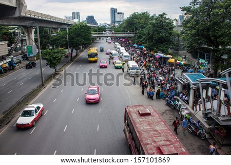 BANGKOK, THAILAND - SEPTEMBER 15: Crowds of people head for Chatuchak market on September 15, 2013 in Bangkok, Thailand. Chatuchak weekend market is the largest in Thailand.