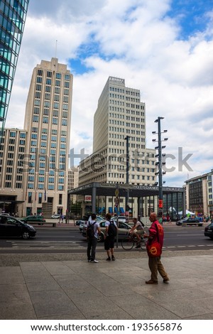 BERLIN, GERMANY - JUNE 8: Potsdamer Platz and railway station in Berlin, Germany on June 8, 2013. It\'s a one of the main public squares and traffic intersections in the center of Berlin.