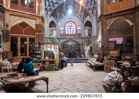 KASHAN, IRAN - MARCH 9: Unidentified people in a bazaar in Kashan, Iran on March 9, 2013. Kashan is a city in central Iran with population of 248,000.