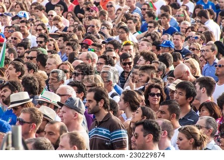 ROME, ITALY - JUNE 24: Crowd of football fans in Rome, Italy on June 24, 2014. They watch the match Italy-Uruguay of the World Cup.
