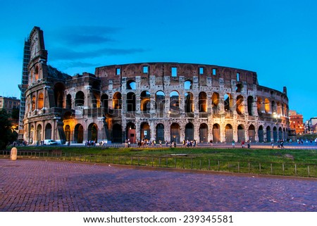 ROME - JUNE 25: Evening view of Colosseum exterior on June 25, 2014 in Rome, Italy. The Colosseum is one of Rome\'s most popular tourist attractions with over 5 million visitors per year.