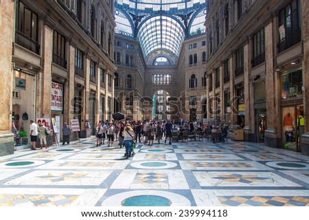 NAPLES, ITALY- JULY 1, 2014: Shopping gallery Galleria Umberto in Naples, Italy. Naples historic city center is the largest in Europe, and is listed by UNESCO as a World Heritage Site.