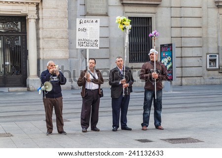 ZARAGOZA, SPAIN, NOVEMBER 1, 2014: Group of men sing religious catholic songs in Zaragoza, Spain.