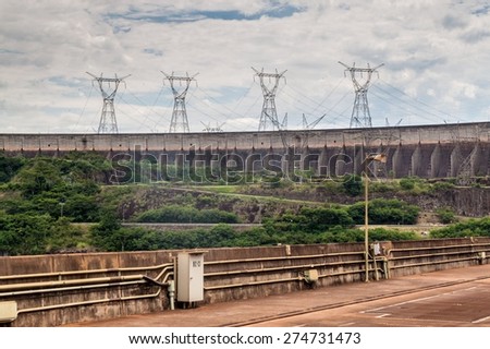 Power lines next to Itaipu dam on river Parana on the border of Brazil and Paraguay