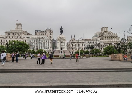 LIMA, PERU - JUNE 4, 2015: White colonial houses lining Plaza San Martin square in Lima, Peru