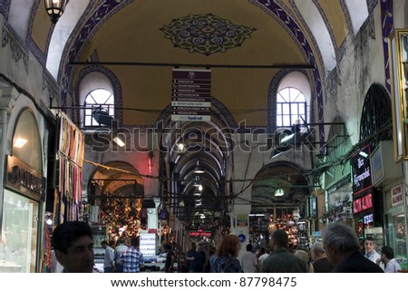 ISTANBUL, TURKEY - JULY 13: People shop at Grand Bazaar on July 13, 2011 in Istanbul, Turkey. Grand Bazaar is the biggest bazaar in Istanbul