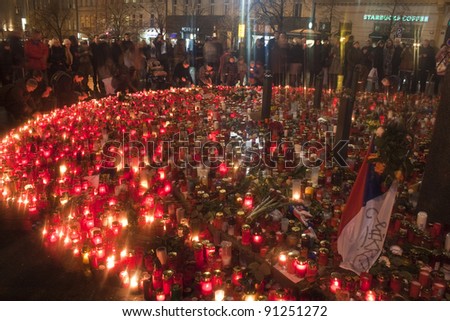 PRAGUE, CZECH REP. - DEC 21:People light candles on Wenceslas square in honor of deceased former president of Czechoslovakia and Czech Republic, Vaclav Havel on December 21, 2011 in Prague, Czech Rep.