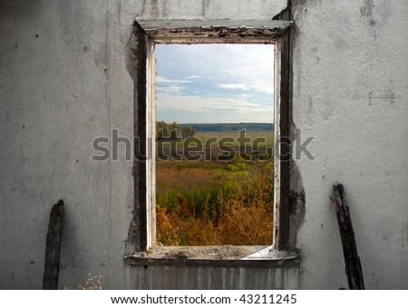 Look at nature landscape through the window of deserted house