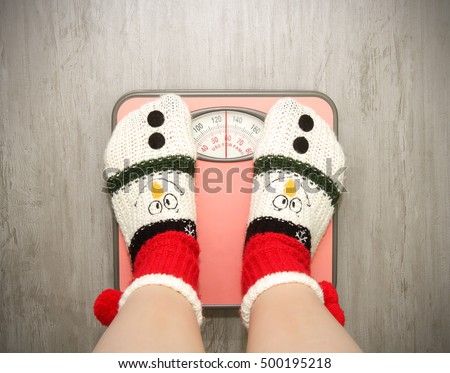 girl standing on floor vysah in Christmas socks