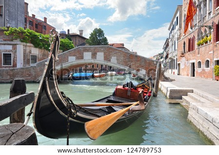 Gondola on a beautiful canal in Venice, Italy