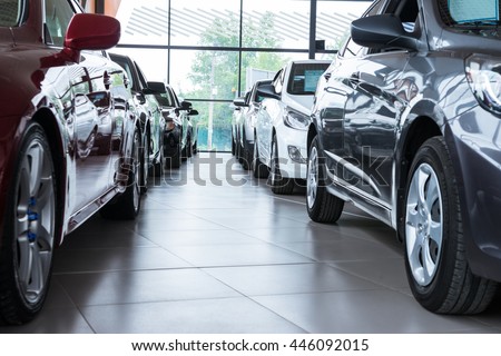 Modern beautiful showroom with cars being sold