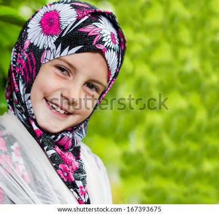 Little muslim girl portrait outdoor