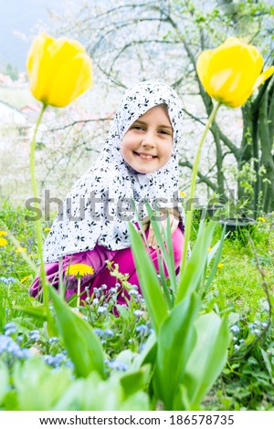 Little muslim girl outdoor - Spring time