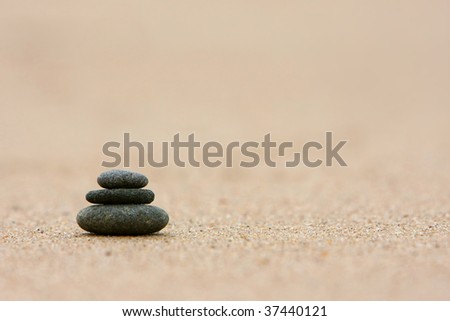 Pebbles stacked on the beach