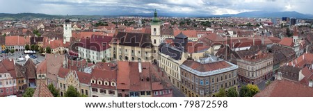 Panorama of old town Sibiu in Transylvania Romania: Council tower, Small Square, Catholic Church and other old buildings
