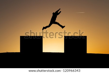 jumping a gap in sunset