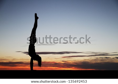 handstand in sunset