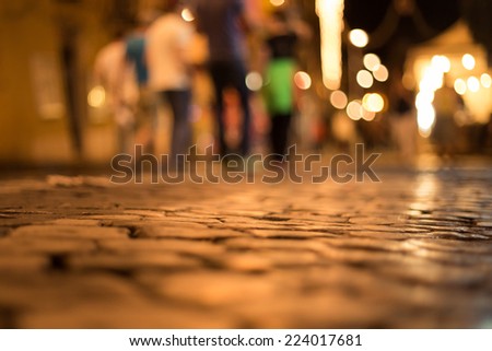 cobblestone road at night in Italy