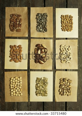 assorted nuts and seeds on paper and battens