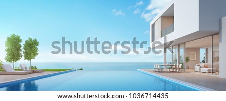 Luxury beach house with sea view swimming pool and terrace in modern design, Lounge chairs on wooden floor deck at vacation home or hotel - 3d illustration of contemporary holiday villa exterior