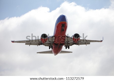 LOS ANGELES, CALIFORNIA, USA - APRIL 27: A Southwest Airlines Boeing 737 landing at Los Angeles Airport on April 27, 2012. The non-circular \