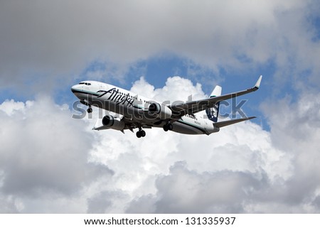LOS ANGELES, CALIFORNIA, USA - MARCH 8, : Alaska Airlines Boeing 737-890 lands at Los Angeles Airport on March 8, 2013. The plane has a range of 5,765 km with 160 seats.